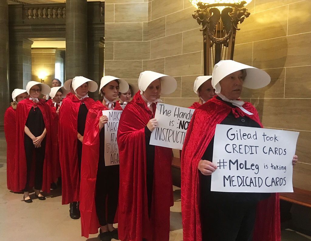 Women dress as characters from Margaret Atwood's book "The Handmaid's Tale"